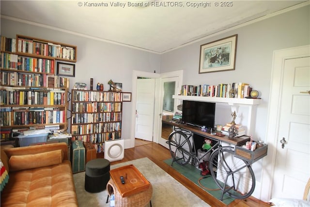 515 Maxwell St, Charleston, WV 25311 - living area featuring ornamental molding, wood finished floors, and a desk