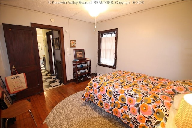 407 Carolina St, Charleston, WV 25311 - bedroom with dark wood finished floors and baseboards