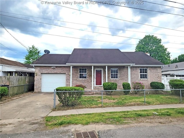 1605 Dunbar Ave, Dunbar, WV 25064 - view of front of property with an attached garage, brick siding, concrete driveway, and a fenced front yard