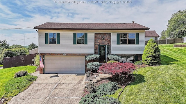 100 Timberlake Cir, Scott Depot, WV 25560 - bi-level home with brick siding, a garage, and driveway