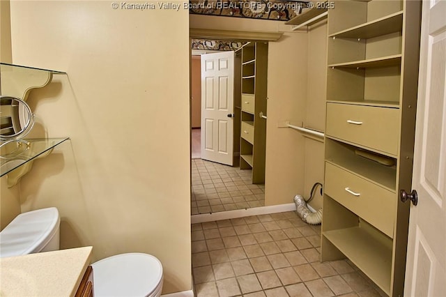 100 Timberlake Cir, Scott Depot, WV 25560 - bathroom featuring toilet, tile patterned floors, vanity, and baseboards