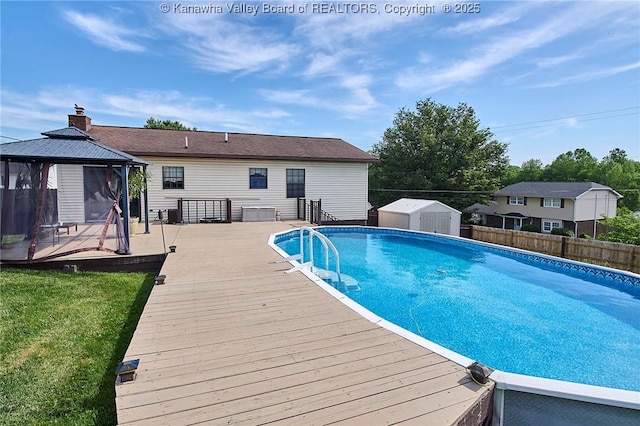 100 Timberlake Cir, Scott Depot, WV 25560 - view of swimming pool featuring a gazebo and a wooden deck