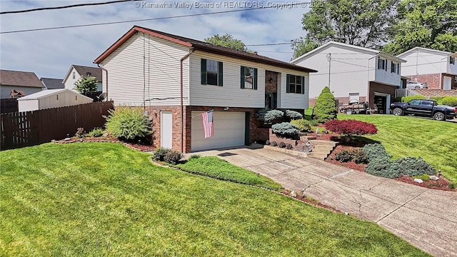 100 Timberlake Cir, Scott Depot, WV 25560 - view of front facade featuring a garage, brick siding, and driveway