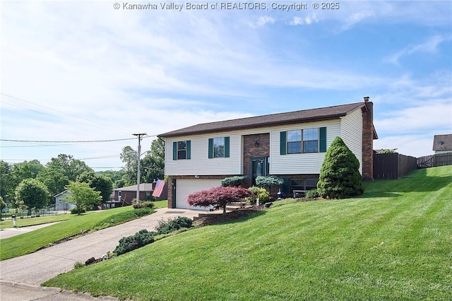 100 Timberlake Cir, Scott Depot, WV 25560 - split foyer home with an attached garage, brick siding, concrete driveway, and a chimney