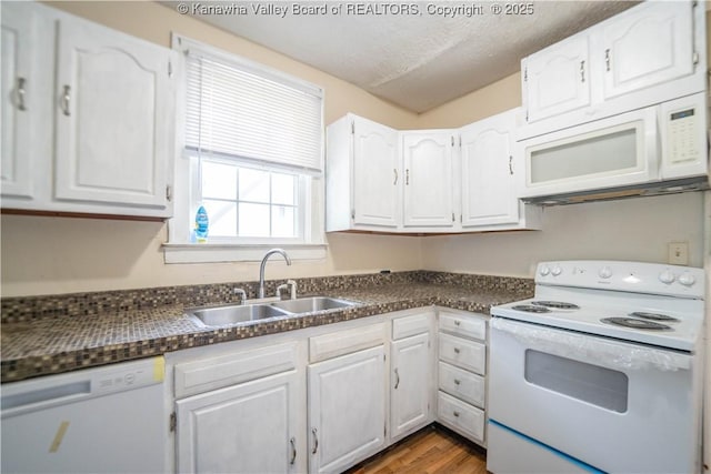 300 Forest Cir S, Charleston, WV 25303 - kitchen featuring white appliances, white cabinets, dark countertops, wood finished floors, and a textured ceiling