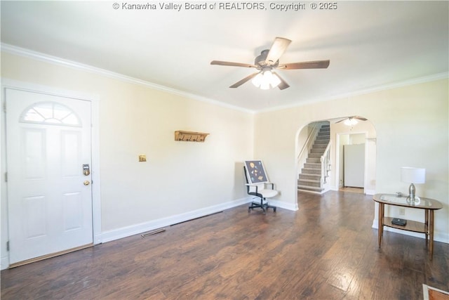 300 Forest Cir S, Charleston, WV 25303 - unfurnished room featuring ornamental molding, a ceiling fan, stairs, wood finished floors, and arched walkways