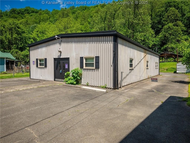 463 Gap View Dr, Charleston, WV 25326 - view of outbuilding featuring a forest view