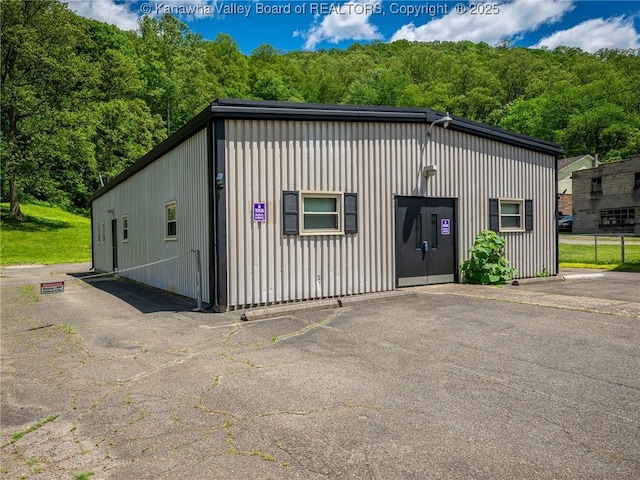 463 Gap View Dr, Charleston, WV 25326 - view of outbuilding featuring a forest view