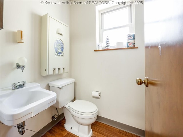 463 Gap View Dr, Charleston, WV 25326 - bathroom with toilet, wood finished floors, and a sink
