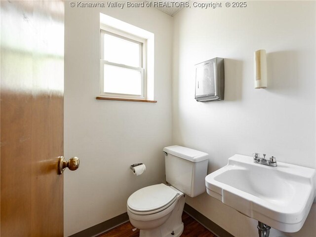 463 Gap View Dr, Charleston, WV 25326 - bathroom featuring a sink, toilet, wood finished floors, and baseboards