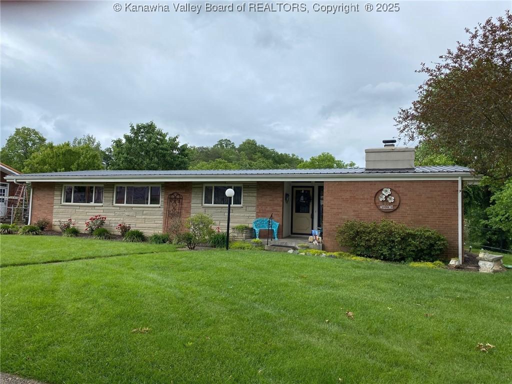 5448 Williams Dr, Charleston, WV 25313 - ranch-style house featuring a chimney, a front lawn, and brick siding
