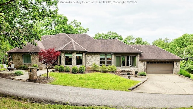 920 Gordon Dr Unit A, Charleston, WV 25303 - view of front of property with an attached garage, driveway, a front lawn, and brick siding
