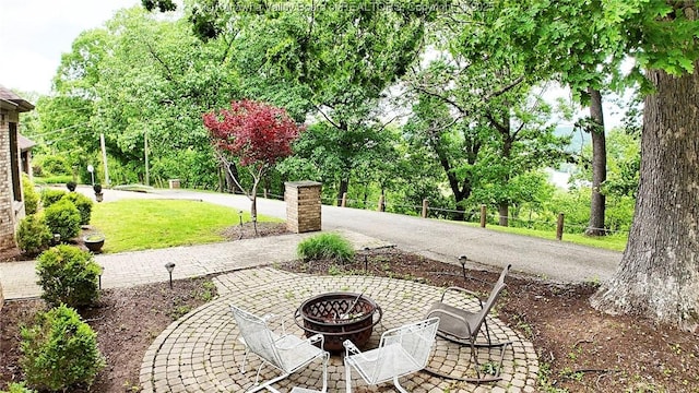 920 Gordon Dr Unit A, Charleston, WV 25303 - view of grassy yard featuring a fire pit