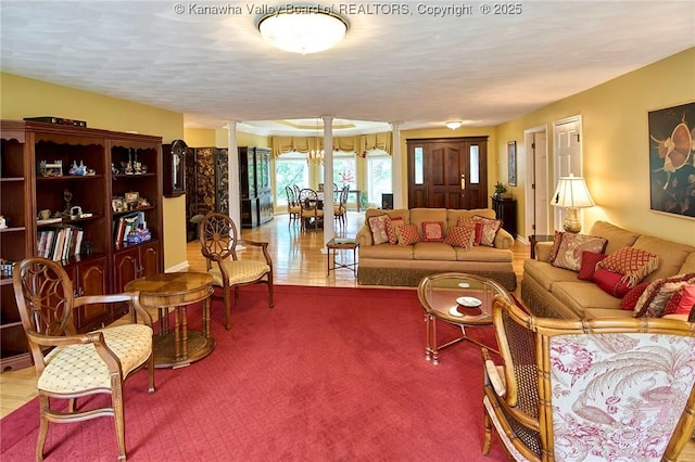 920 Gordon Dr Unit A, Charleston, WV 25303 - carpeted living room with decorative columns