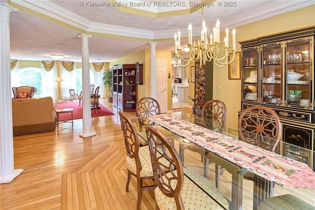 920 Gordon Dr Unit A, Charleston, WV 25303 - dining room with decorative columns, light wood finished floors, ornamental molding, a chandelier, and a raised ceiling