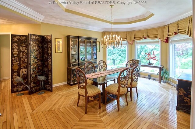 920 Gordon Dr Unit A, Charleston, WV 25303 - dining space with a tray ceiling, a chandelier, ornamental molding, and light wood-style floors