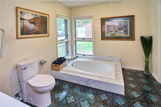 920 Gordon Dr Unit A, Charleston, WV 25303 - full bathroom with a garden tub and tile patterned floors