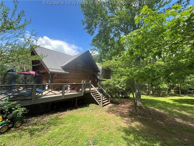 849 Random Rd, Ripley, WV 25271 - back of house featuring a yard, metal roof, a wooden deck, and stairs