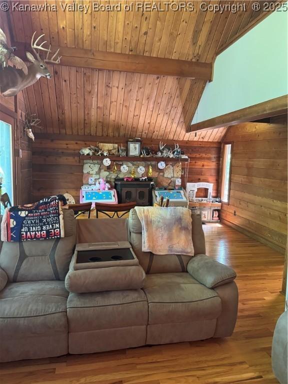 849 Random Rd, Ripley, WV 25271 - living room with wooden walls, wood finished floors, wood ceiling, and healthy amount of natural light