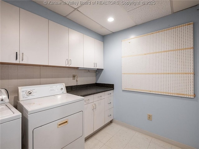 1799 Fishers Branch Rd, Charleston, WV 25312 - washroom featuring cabinet space, washer and clothes dryer, and baseboards