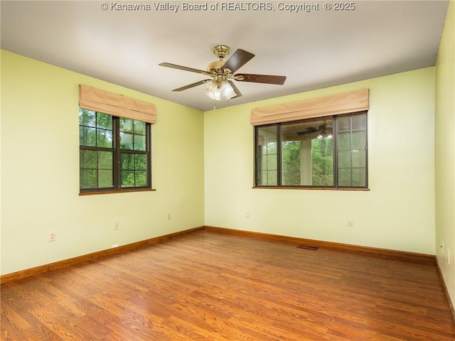 1799 Fishers Branch Rd, Charleston, WV 25312 - empty room featuring wood finished floors, baseboards, and a ceiling fan