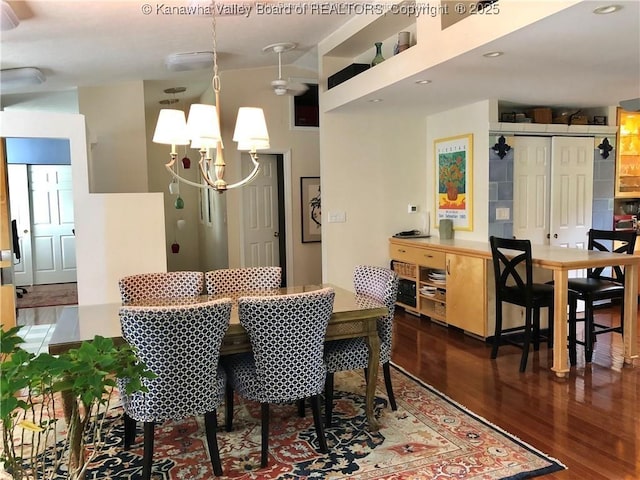138 Woodbridge Dr, Charleston, WV 25311 - dining area with wood finished floors, a chandelier, and recessed lighting