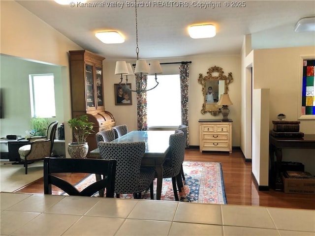 138 Woodbridge Dr, Charleston, WV 25311 - dining room featuring a chandelier and wood finished floors