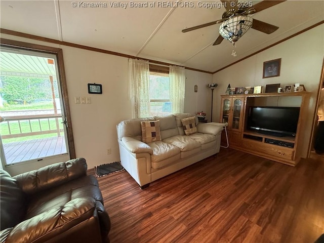 12 Brewster Dr, Chapmanville, WV 25508 - living room featuring lofted ceiling, dark wood finished floors, crown molding, ceiling fan, and healthy amount of natural light