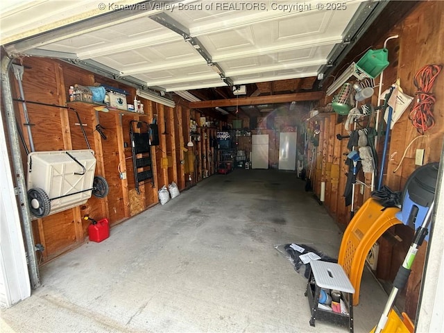 12 Brewster Dr, Chapmanville, WV 25508 - garage featuring a garage door opener