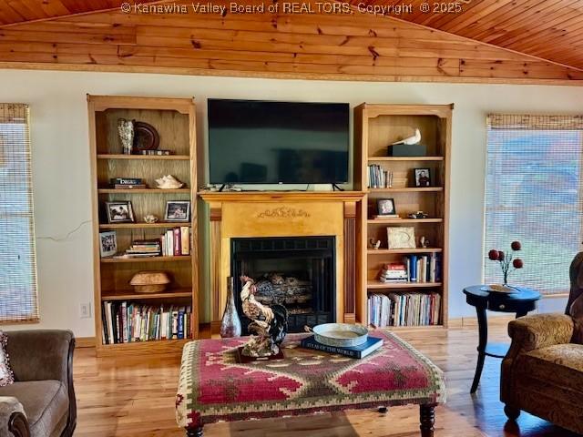 80 Flint Ln, Racine, WV 25165 - living room featuring lofted ceiling, wooden ceiling, a fireplace, and wood finished floors