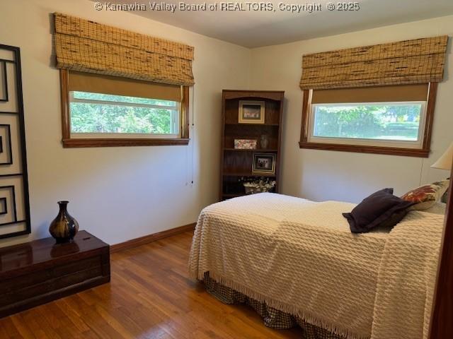 80 Flint Ln, Racine, WV 25165 - bedroom with multiple windows, wood finished floors, and baseboards