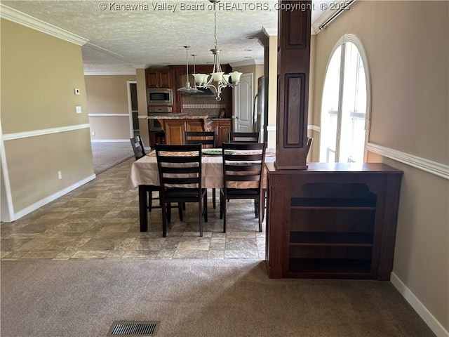 30 Beech Ln, Madison, WV 25130 - dining room with a chandelier, dark carpet, baseboards, crown molding, and a textured ceiling