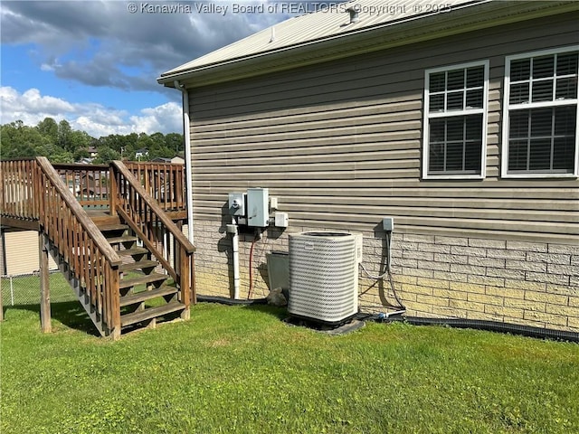 30 Beech Ln, Madison, WV 25130 - view of side of property featuring central air condition unit, stairway, and a wooden deck
