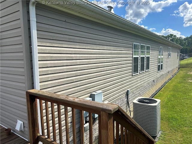 30 Beech Ln, Madison, WV 25130 - view of side of home with cooling unit and a yard