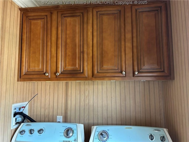 30 Beech Ln, Madison, WV 25130 - washroom featuring cabinet space, separate washer and dryer, and wooden walls