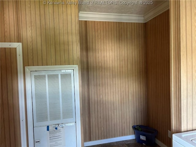 30 Beech Ln, Madison, WV 25130 - detailed view of a heating unit, ornamental molding, wood walls, and baseboards