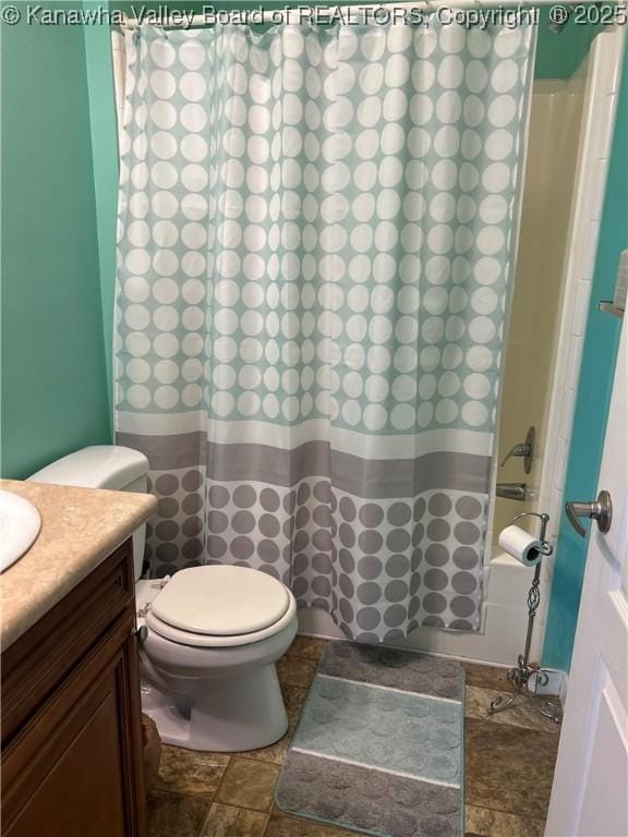 30 Beech Ln, Madison, WV 25130 - full bath featuring vanity, shower / tub combo, toilet, and stone finish floors