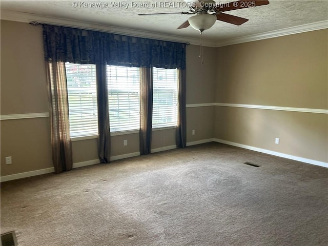 30 Beech Ln, Madison, WV 25130 - empty room with ceiling fan, a textured ceiling, carpet floors, crown molding, and baseboards