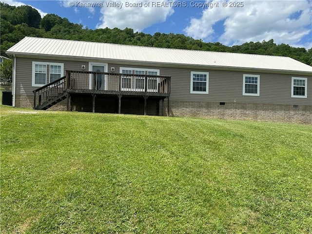 30 Beech Ln, Madison, WV 25130 - rear view of property featuring a wooden deck, a yard, and metal roof