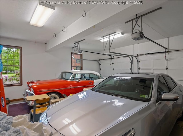 14 Woodclyffe Rd, Hurricane, WV 25526 - garage with a garage door opener and baseboards