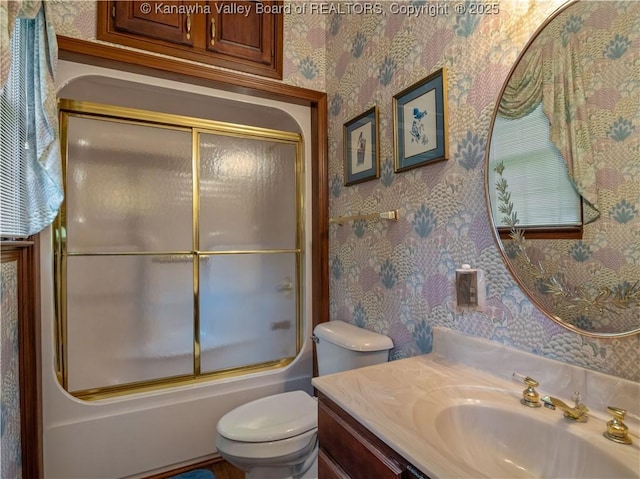 14 Woodclyffe Rd, Hurricane, WV 25526 - bathroom featuring wallpapered walls, vanity, bath / shower combo with glass door, and toilet