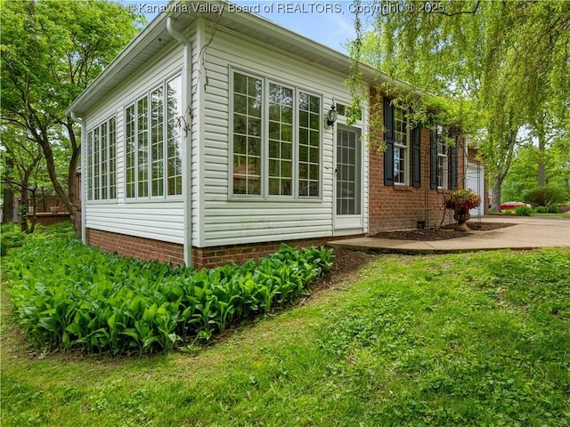 14 Woodclyffe Rd, Hurricane, WV 25526 - view of home's exterior with concrete driveway and a lawn