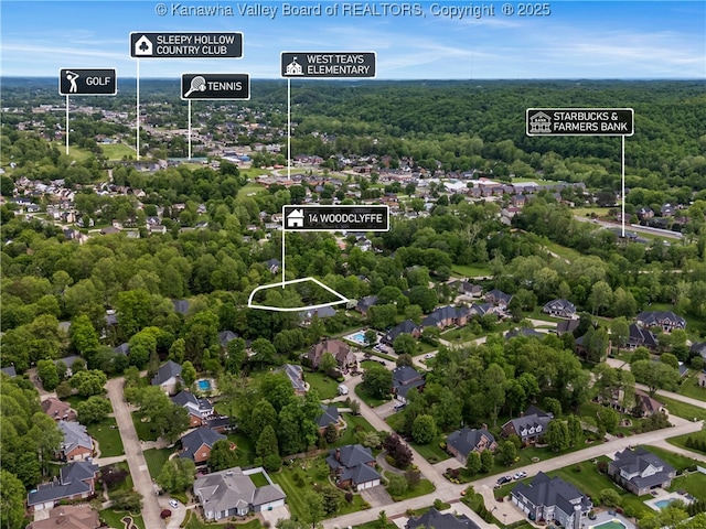 14 Woodclyffe Rd, Hurricane, WV 25526 - aerial view of property and surrounding area featuring a forest and property parcel outlined