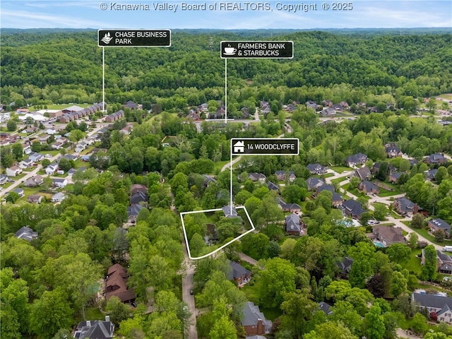 14 Woodclyffe Rd, Hurricane, WV 25526 - aerial view of property's location featuring a heavily wooded area and property boundaries highlighted
