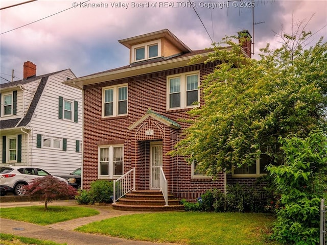 657 Beech Ave, Charleston, WV 25302 - view of front facade featuring brick siding and a front yard