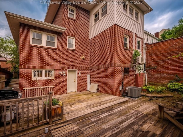 657 Beech Ave, Charleston, WV 25302 - rear view of property with brick siding, central AC, and a deck