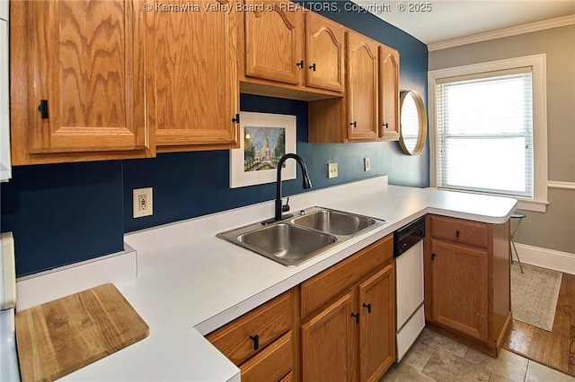 1313 Lee St E Unit 233, Charleston, WV 25301 - kitchen featuring a sink, light countertops, dishwasher, brown cabinetry, and crown molding