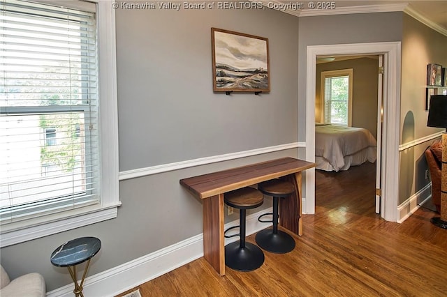1313 Lee St E Unit 233, Charleston, WV 25301 - hallway with crown molding, wood finished floors, and baseboards