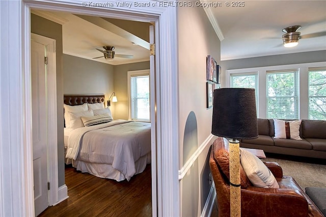1313 Lee St E Unit 233, Charleston, WV 25301 - bedroom with ornamental molding, dark wood-style flooring, and a ceiling fan