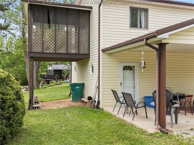 67 Poplar Dr, Scott Depot, WV 25560 - back of house featuring a patio area and a lawn